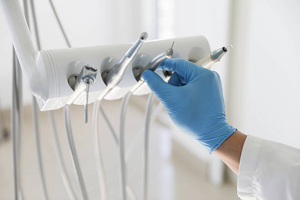 Professional Emergency Dentist technician working in Fort Myers Beach, FL